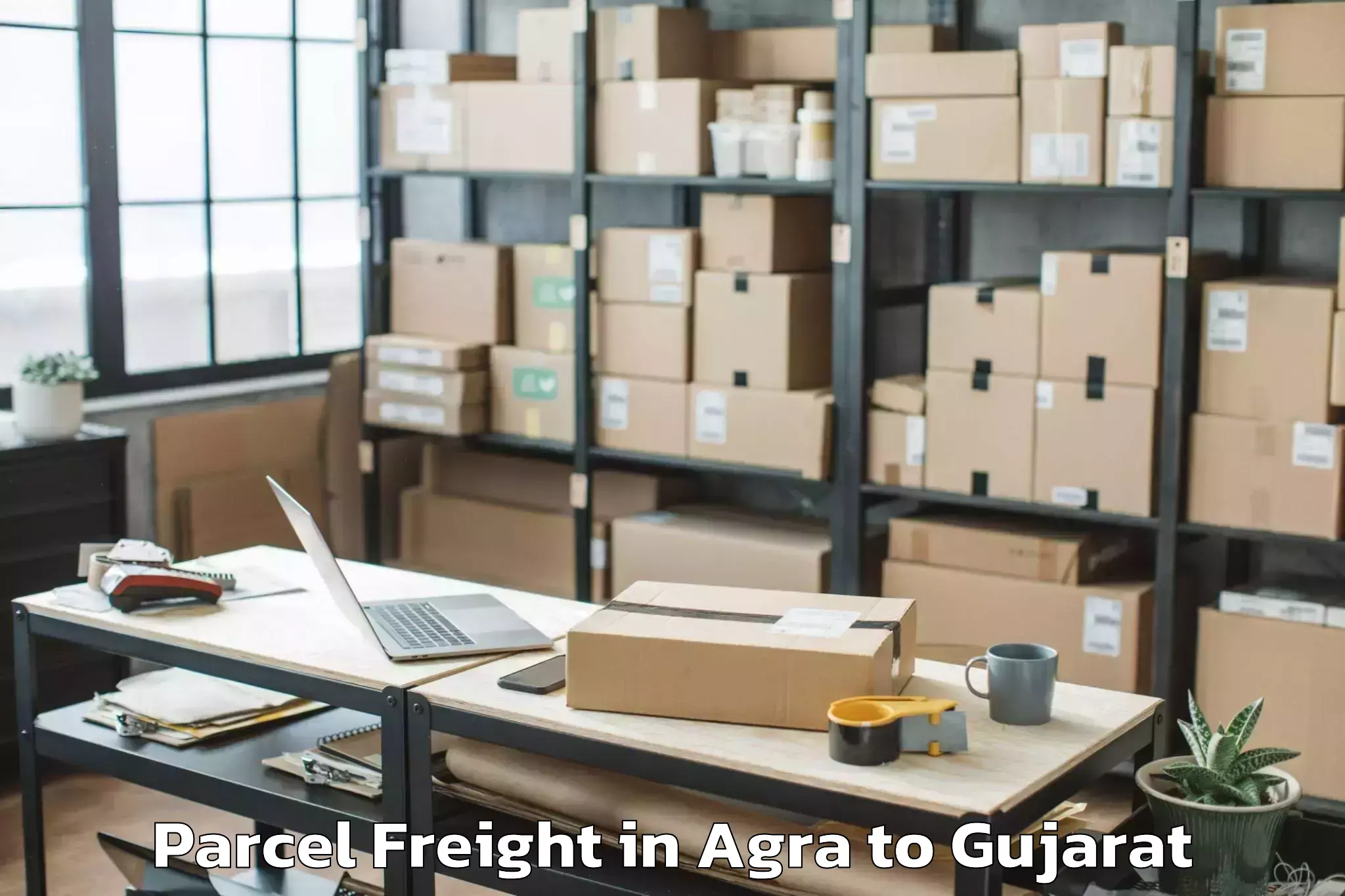 Book Agra to Rajpipla Parcel Freight Online